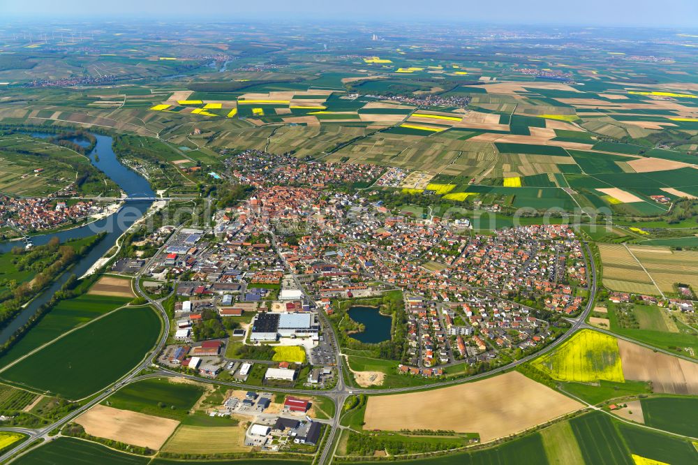 Volkach from above - Urban area with outskirts and inner city area on the edge of agricultural fields and arable land in Volkach in the state Bavaria, Germany