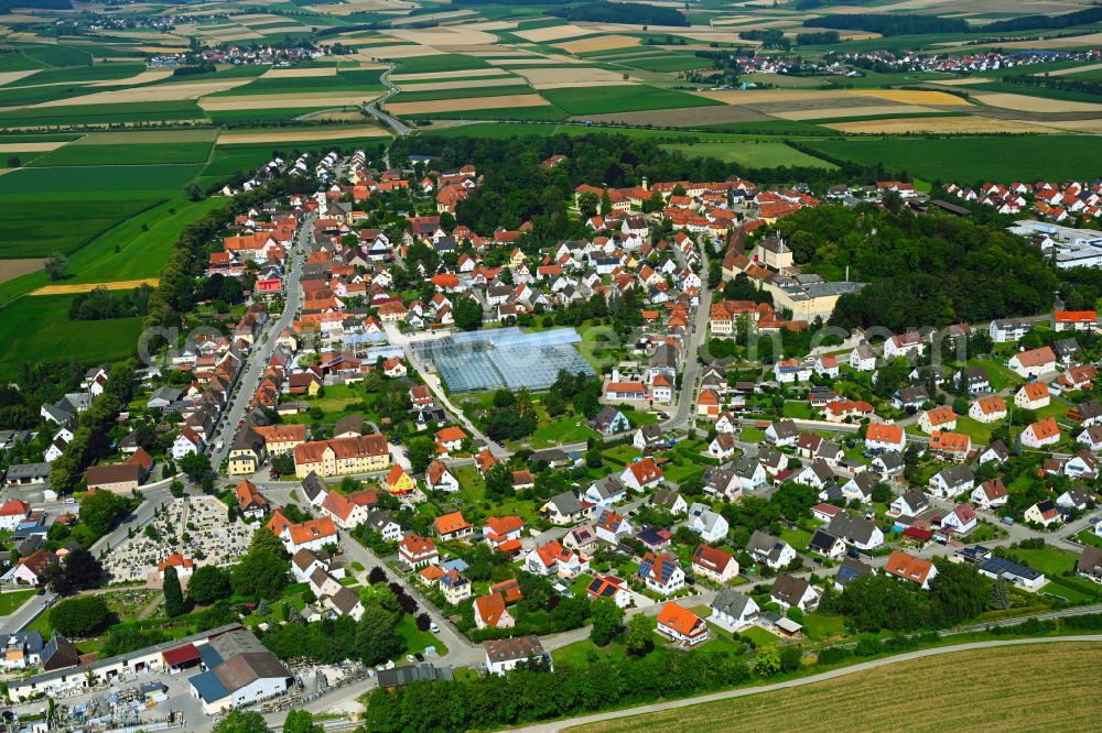 Aerial photograph Wallerstein - Urban area with outskirts and inner city area on the edge of agricultural fields and arable land in Wallerstein in the state Bavaria, Germany