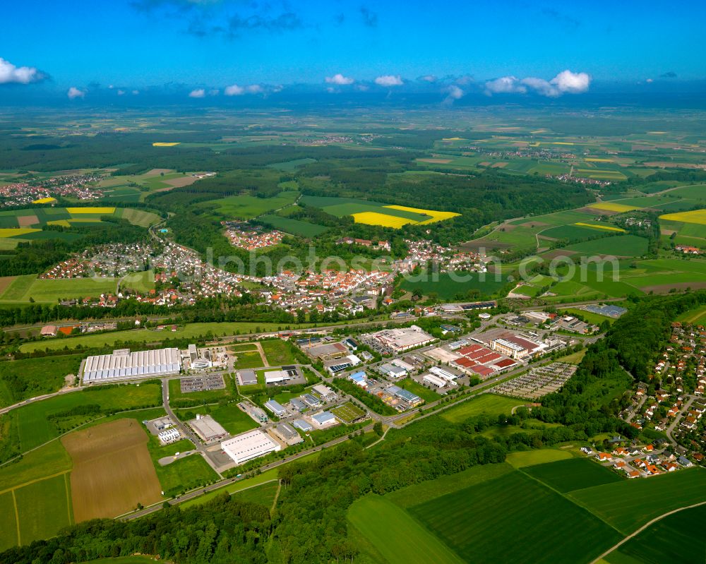 Warthausen from the bird's eye view: Urban area with outskirts and inner city area on the edge of agricultural fields and arable land in Warthausen in the state Baden-Wuerttemberg, Germany