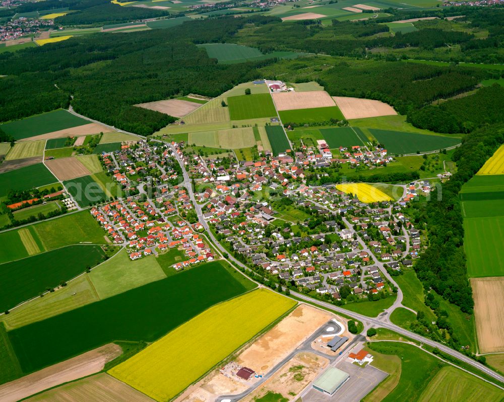 Aerial photograph Warthausen - Urban area with outskirts and inner city area on the edge of agricultural fields and arable land in Warthausen in the state Baden-Wuerttemberg, Germany