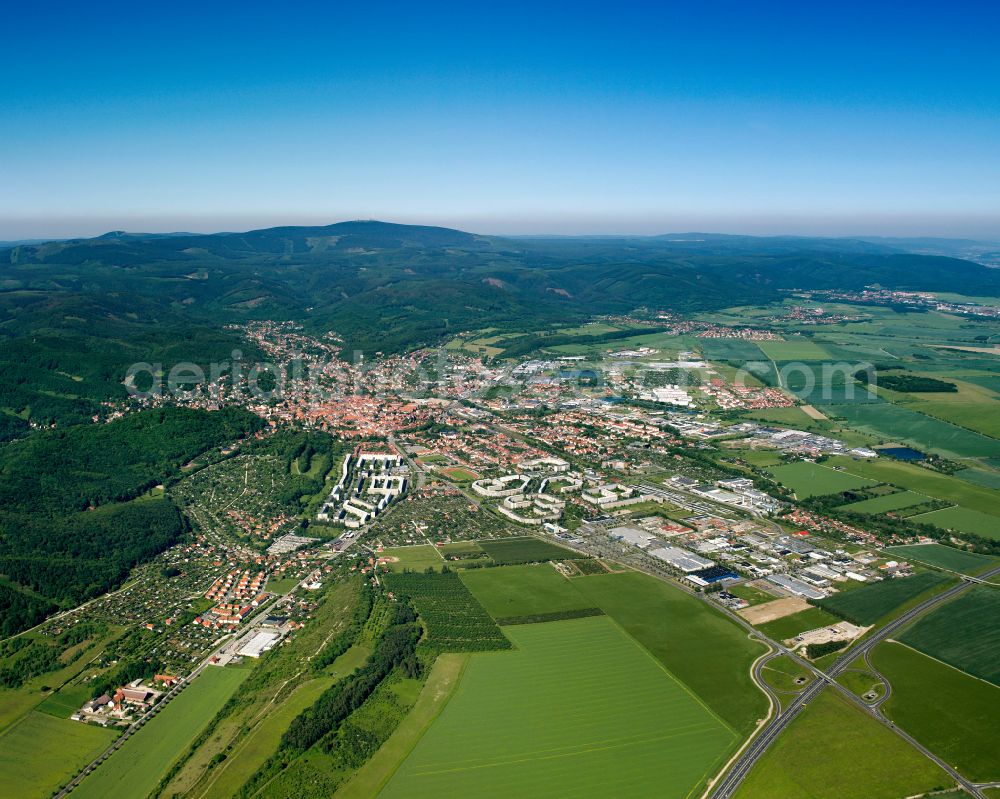 Wernigerode from the bird's eye view: Urban area with outskirts and inner city area on the edge of agricultural fields and arable land in Wernigerode in the Harz in the state Saxony-Anhalt, Germany