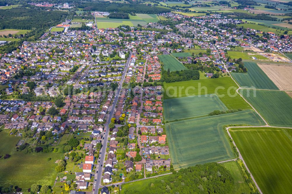 Westtünnen from above - Urban area with outskirts and inner city area on the edge of agricultural fields and arable land in Westtünnen in the state North Rhine-Westphalia, Germany