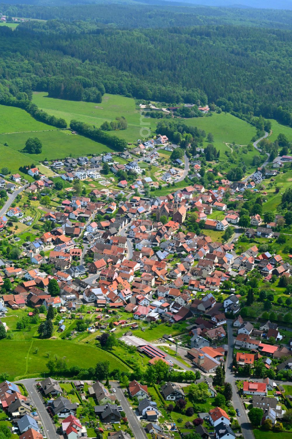 Wiesen from above - Urban area with outskirts and inner city area on the edge of agricultural fields and arable land in Wiesen in the state Bavaria, Germany