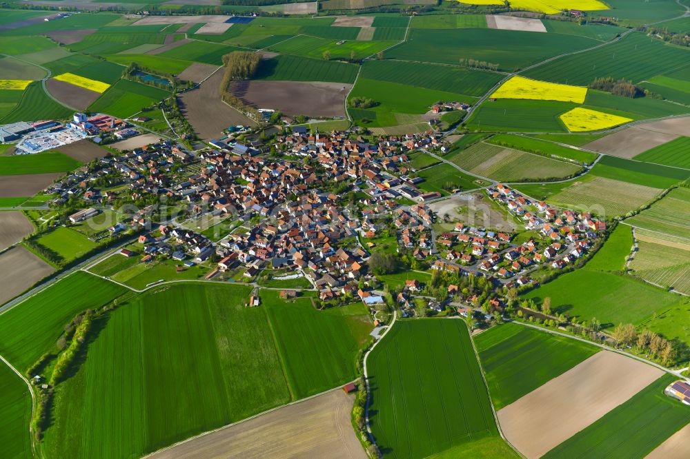 Aerial image Wiesenbronn - Urban area with outskirts and inner city area on the edge of agricultural fields and arable land in Wiesenbronn in the state Bavaria, Germany