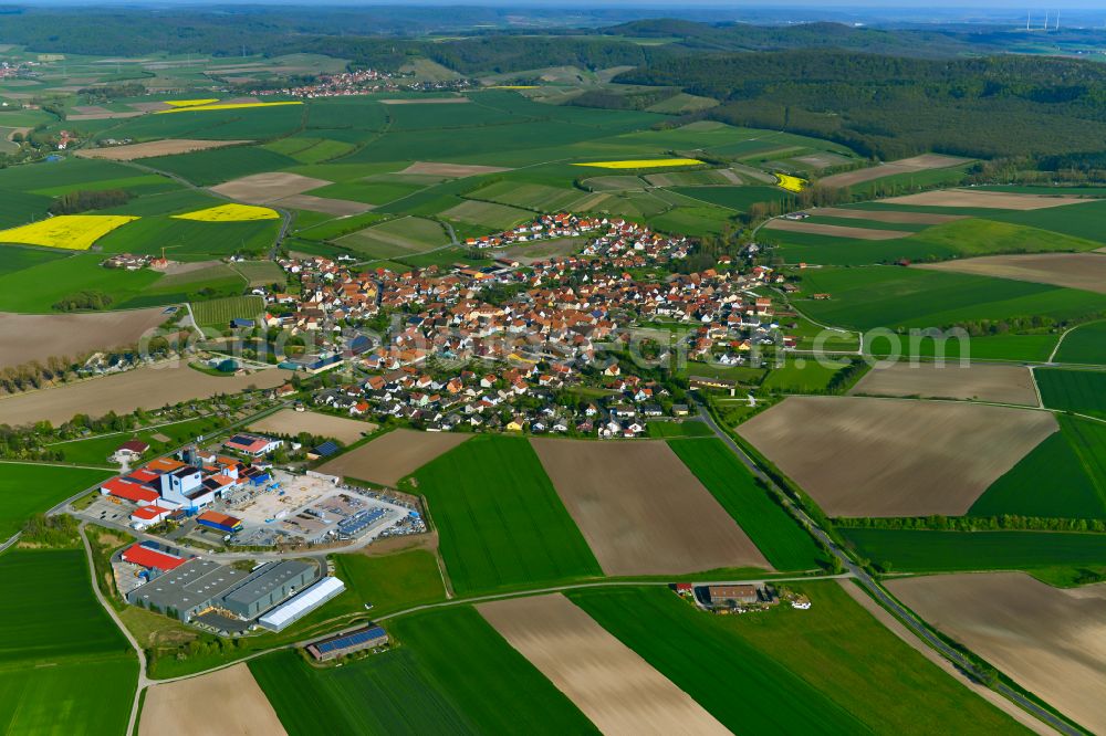 Wiesenbronn from above - Urban area with outskirts and inner city area on the edge of agricultural fields and arable land in Wiesenbronn in the state Bavaria, Germany