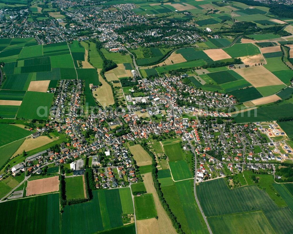 Aerial image Würges - Urban area with outskirts and inner city area on the edge of agricultural fields and arable land in Würges in the state Hesse, Germany