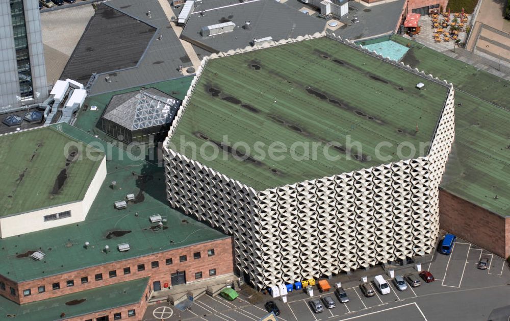 Aerial photograph Chemnitz - Blick auf die Stadthalle von Chemnitz in Sachsen. Im Oktober 1974 wurde die Stadthalle nach 5 - jähriger Bauzeit eröffnet. Seit dem dient die Mehrzweckhalle als Veranstaltungsort für Ausstellungen, Konzerte und allen an deren kulturellen Events. Architekt der ist Rudolf Weißer. Kontakt Stadthalle: Stadthalle Chemnitz, Kultur - und Kongresszentrum GmbH, Theaterstraße 3, 09111 Chemnitz, Tel. - Zentrale +49(0)371 4508 0, Ticket - Hotline +49(0)371 4508 722, Email: geschaeftsfuehrung@stadthalle-chemnitz.de