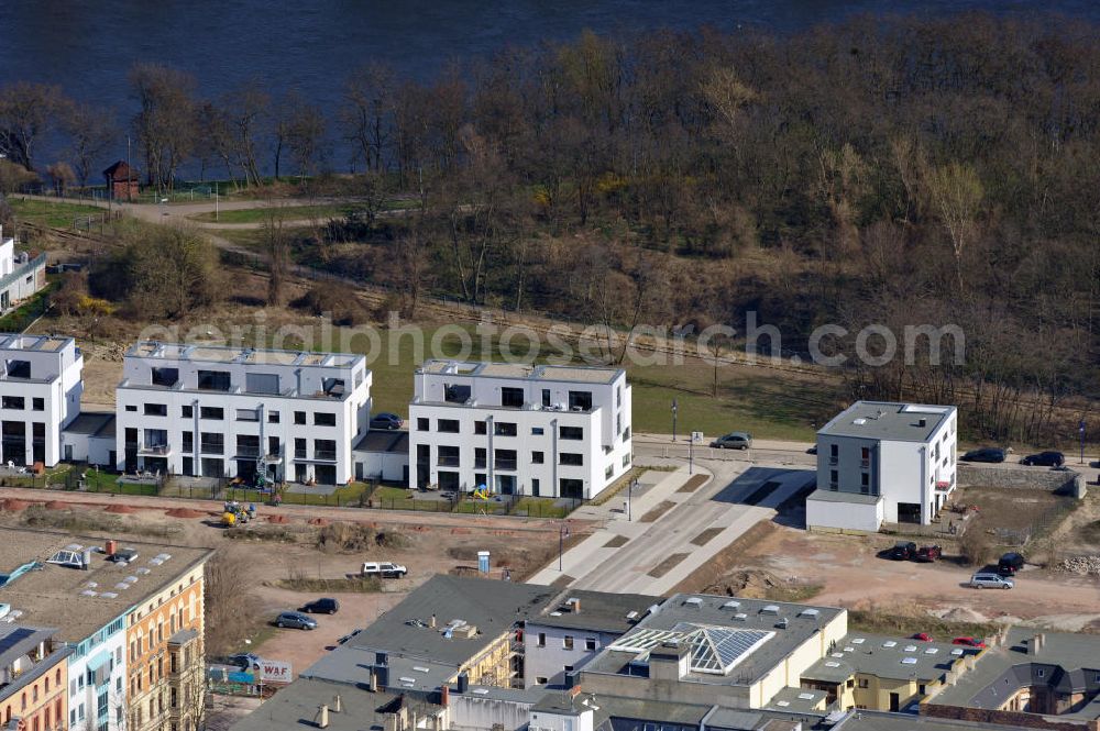 Aerial photograph Magdeburg - Magdeburg 3/28/2012 view newly built townhouses / town houses on the banks of the Elbe opposite the historic lift bridge