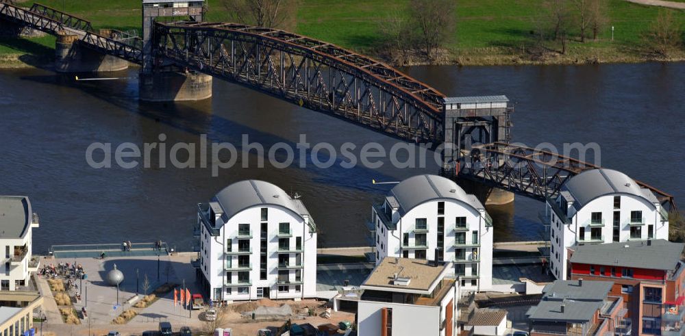 Aerial image Magdeburg - Magdeburg 3/28/2012 view newly built townhouses / town houses on the banks of the Elbe opposite the historic lift bridge