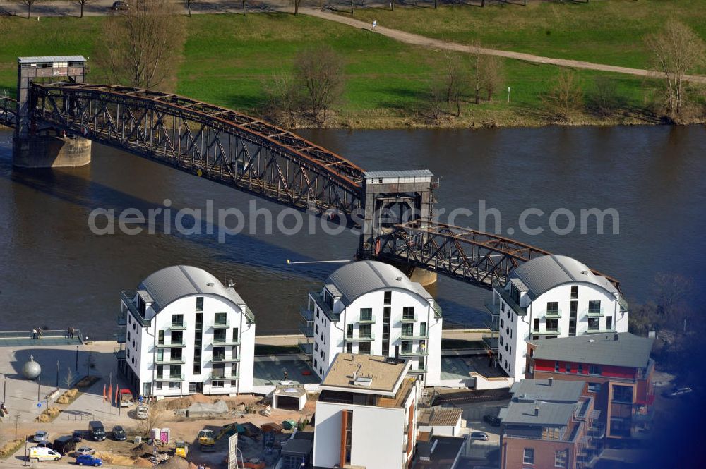 Aerial photograph Magdeburg - Magdeburg 3/28/2012 view newly built townhouses / town houses on the banks of the Elbe opposite the historic lift bridge