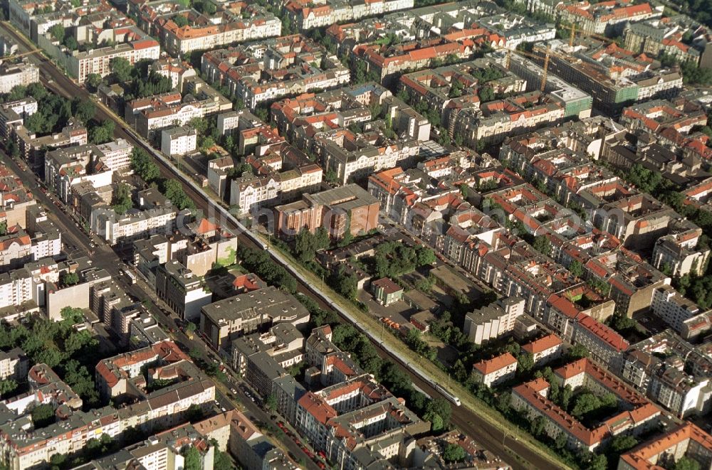 Aerial photograph Berlin - The city district Kant road between S-Bahn station Savigny Platz S-Bahn and station Berlin-Chralottenburg is dominated by residential and commercial buildings. A distinctive building in the center of the picture is the former listed Bewag order and transformer station in Leibnitz street. The MetaHaus, a brick clinker is now a design center