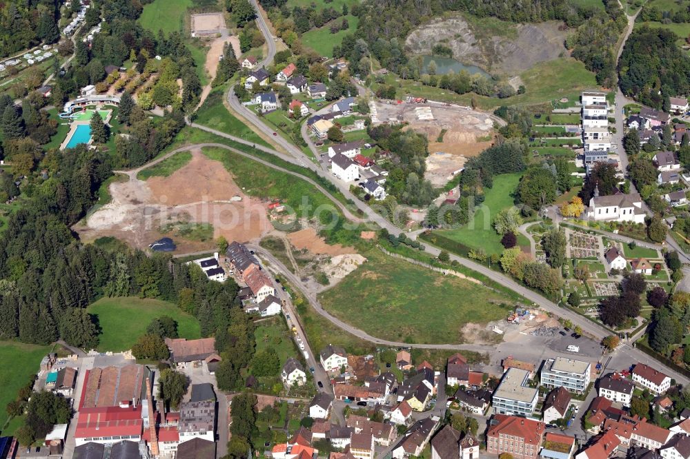 Aerial photograph Kandern - Outskirts residential area with biotope, habitats and lakes in the area of the former clay pit in Kandern in the state Baden-Wurttemberg, Germany