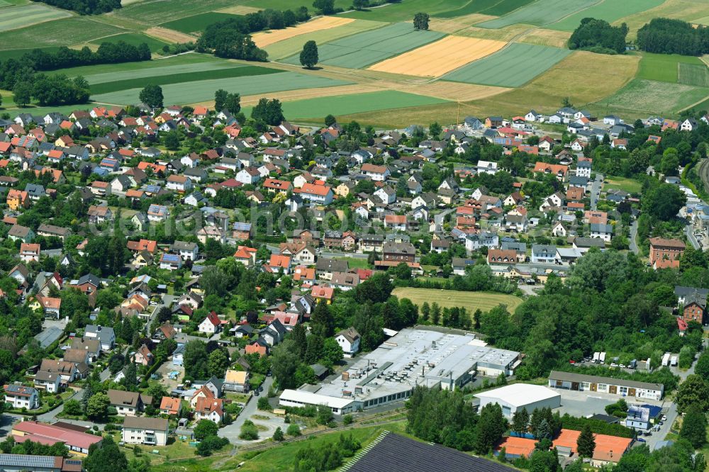 Neuenmarkt from above - Outskirts residential overlooking the work premises of the BayWa AG in the district Hegnabrunn in Neuenmarkt in the state Bavaria, Germany