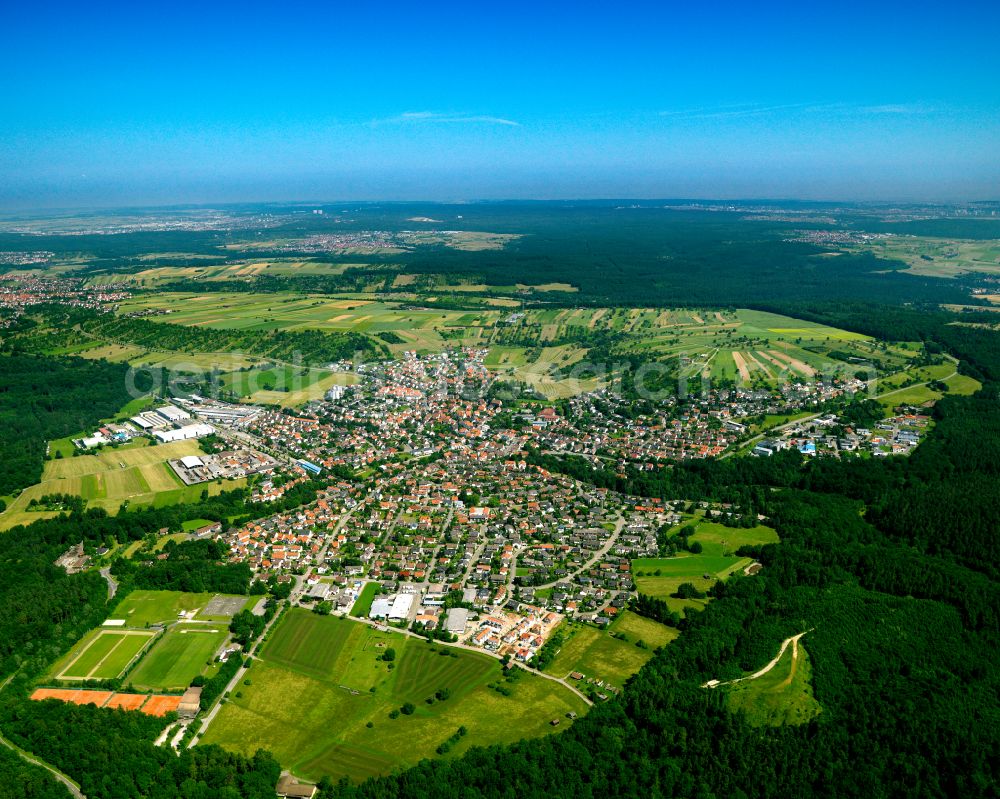 Dettenhausen from the bird's eye view: City view from the outskirts with adjacent agricultural fields in Dettenhausen in the state Baden-Wuerttemberg, Germany