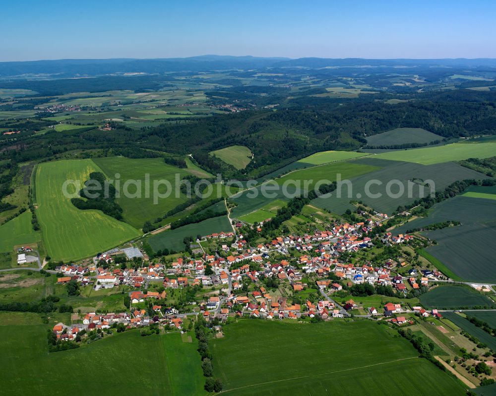 Ecklingerode from the bird's eye view: City view from the outskirts with adjacent agricultural fields in Ecklingerode in the state Thuringia, Germany