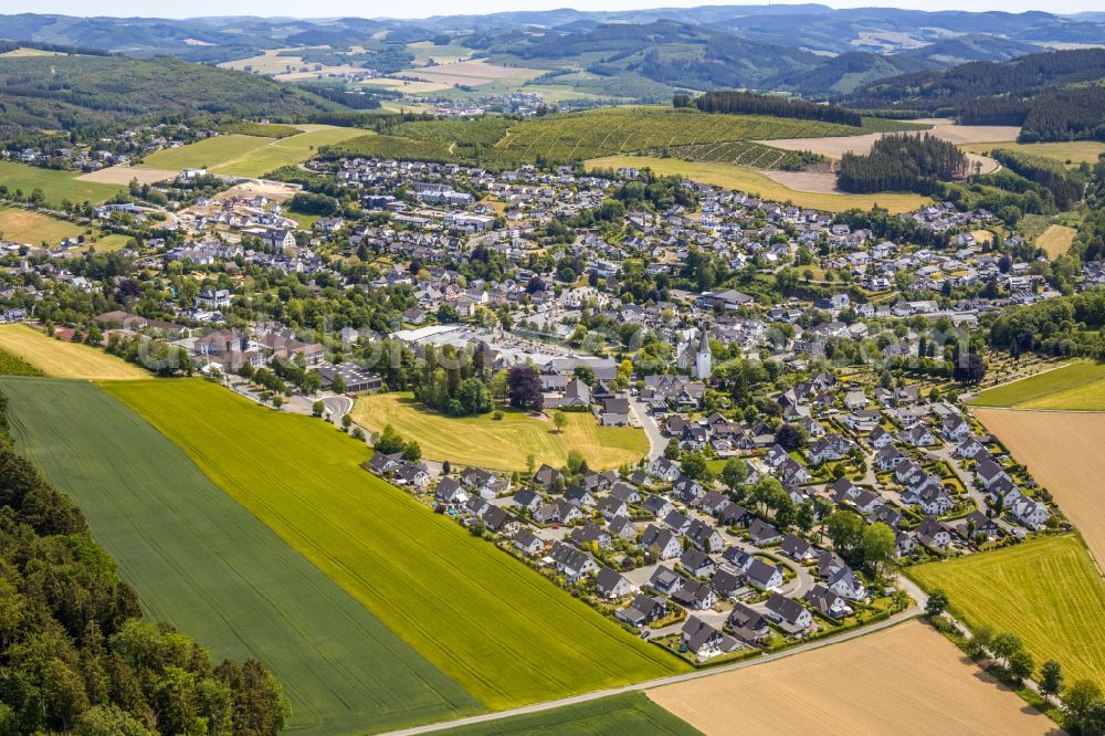 Eslohe (Sauerland) from above - City view from the outskirts with adjacent agricultural fields in Eslohe (Sauerland) in the state North Rhine-Westphalia, Germany