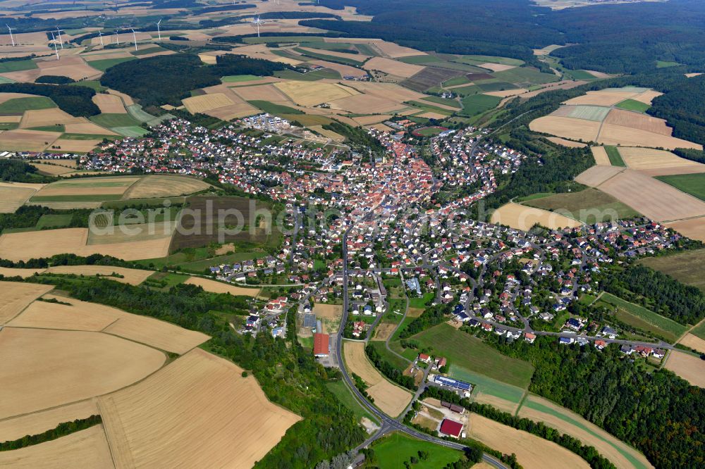 Güntersleben from the bird's eye view: City view from the outskirts with adjacent agricultural fields in Güntersleben in the state Bavaria, Germany