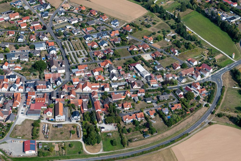 Aerial image Gössenheim - City view from the outskirts with adjacent agricultural fields in Goessenheim in the state Bavaria, Germany