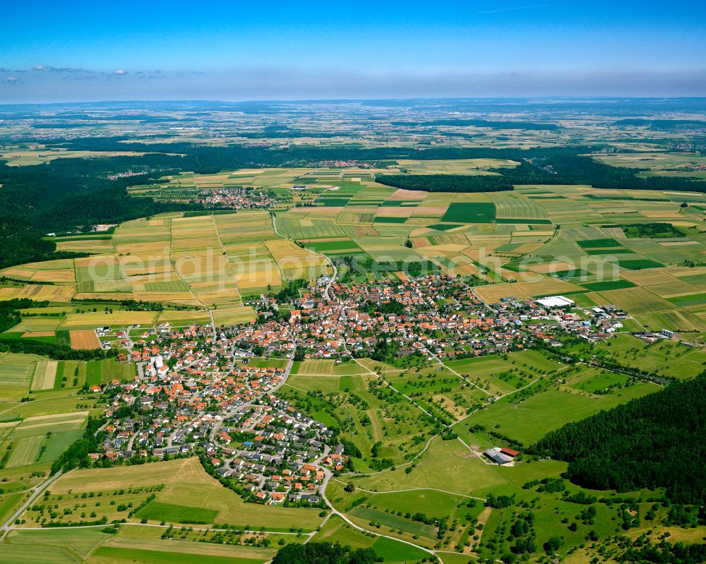 Hirrlingen from above - City view from the outskirts with adjacent agricultural fields in Hirrlingen in the state Baden-Wuerttemberg, Germany