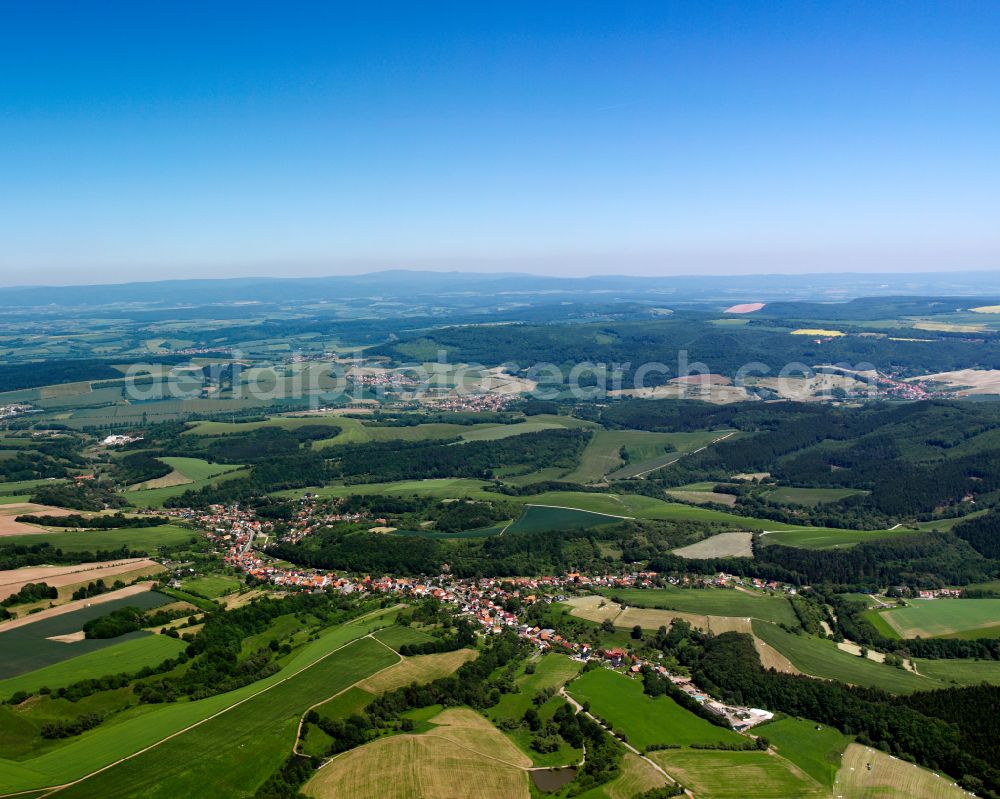 Hundeshagen from the bird's eye view: City view from the outskirts with adjacent agricultural fields in Hundeshagen in the state Thuringia, Germany