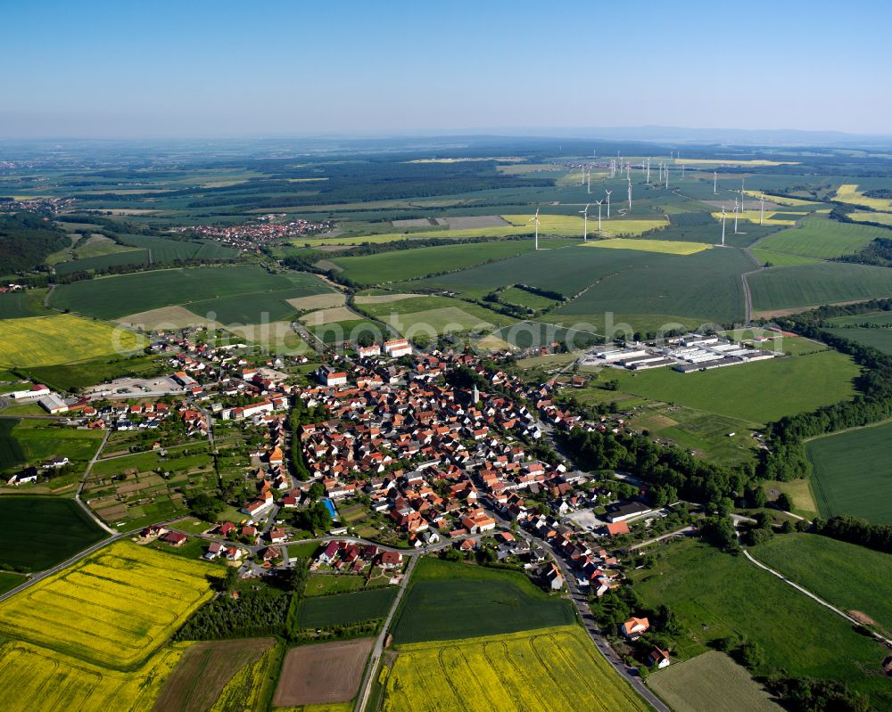 Küllstedt from the bird's eye view: City view from the outskirts with adjacent agricultural fields in Küllstedt in the state Thuringia, Germany