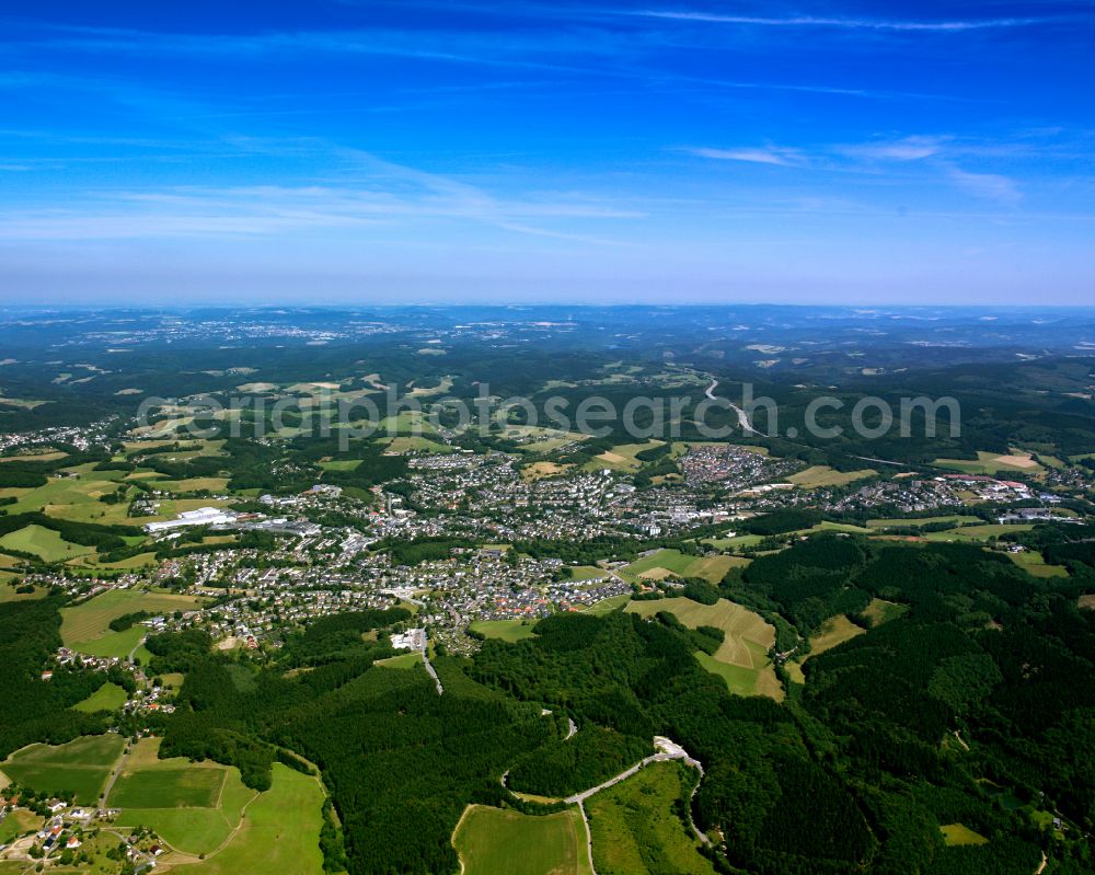 Meinerzhagen from above - City view from the outskirts with adjacent agricultural fields in Meinerzhagen in the state North Rhine-Westphalia, Germany