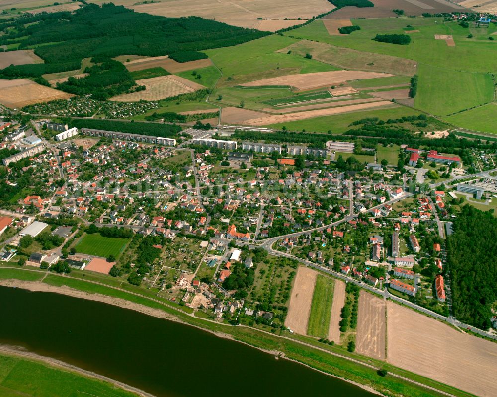 Nünchritz from the bird's eye view: City view from the outskirts with adjacent agricultural fields in Nünchritz in the state Saxony, Germany