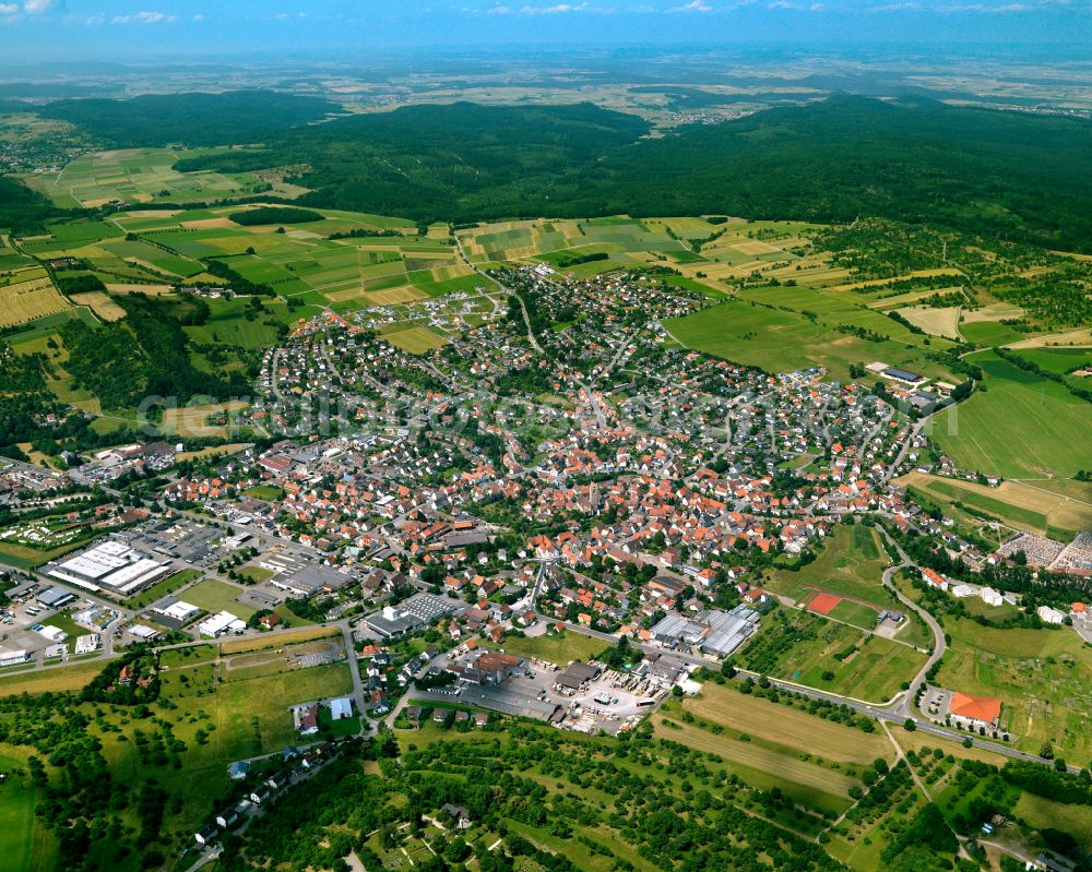 Ofterdingen from the bird's eye view: City view from the outskirts with adjacent agricultural fields in Ofterdingen in the state Baden-Wuerttemberg, Germany