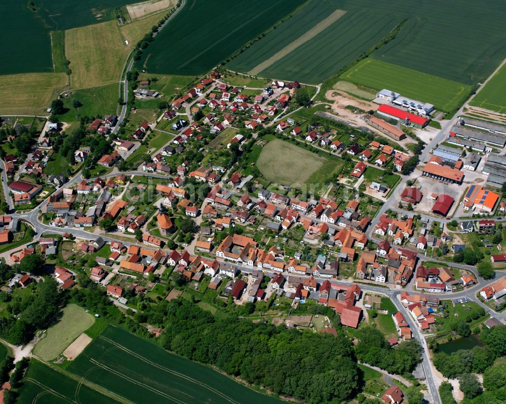 Reinholterode from the bird's eye view: City view from the outskirts with adjacent agricultural fields in Reinholterode in the state Thuringia, Germany