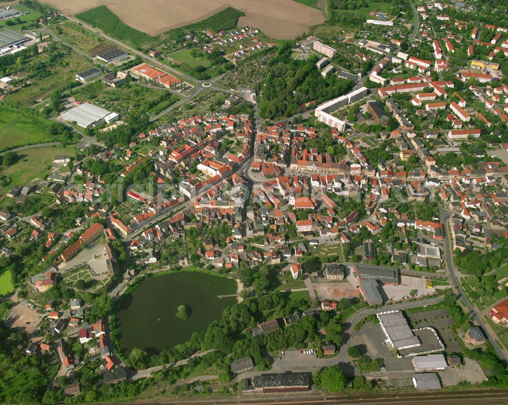 Ronneburg from the bird's eye view: City view from the outskirts with adjacent agricultural fields in Ronneburg in the state Thuringia, Germany