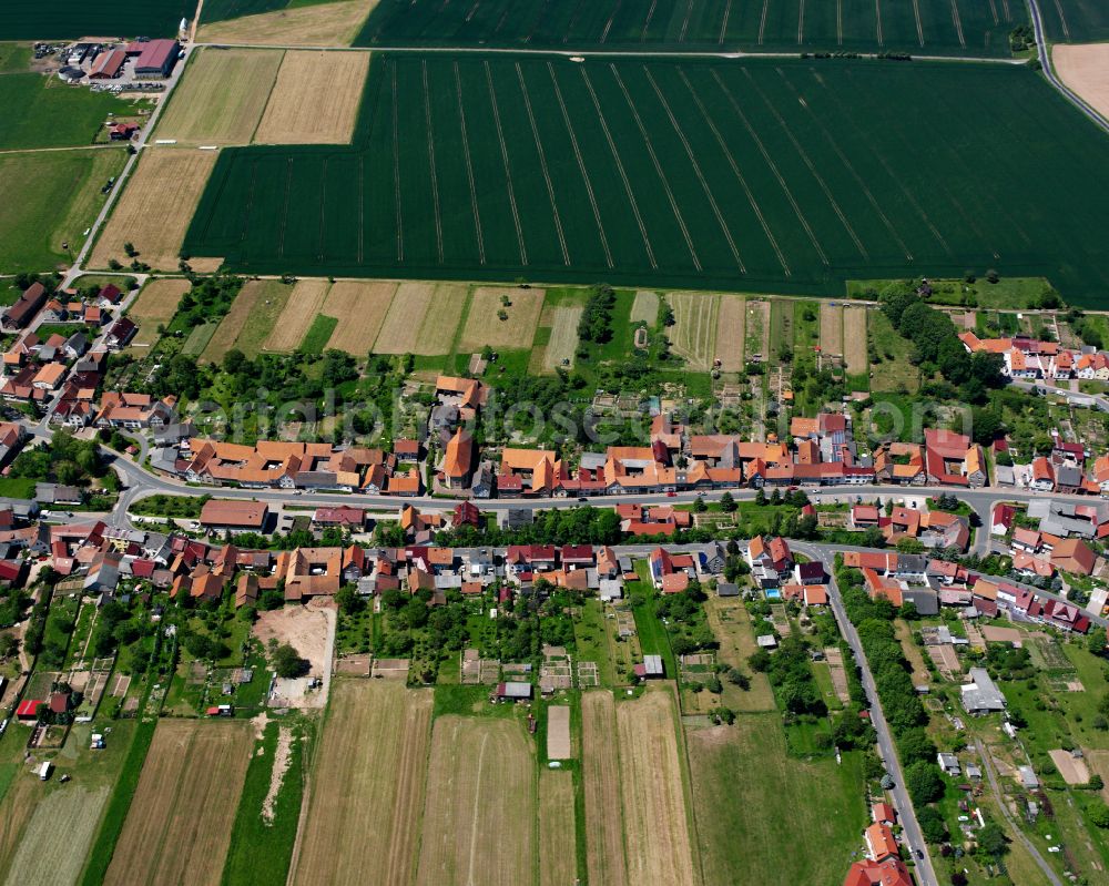 Steinbach from the bird's eye view: City view from the outskirts with adjacent agricultural fields in Steinbach in the state Thuringia, Germany