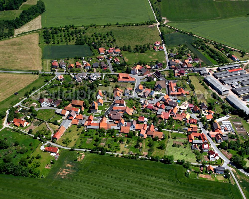 Aerial photograph Tastungen - City view from the outskirts with adjacent agricultural fields in Tastungen in the state Thuringia, Germany