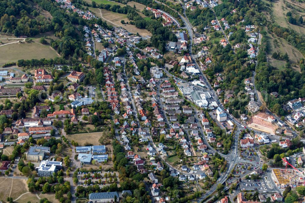 Aerial image Wombach - City view from the outskirts with adjacent agricultural fields in Wombach in the state Bavaria, Germany