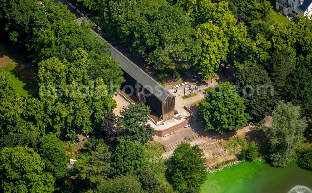 Werne from above - Salt works and town lake in Werne in the state of North Rhine-Westphalia. The compound and wooden facilities for salt production are located on the northern shore of the lake in a forest