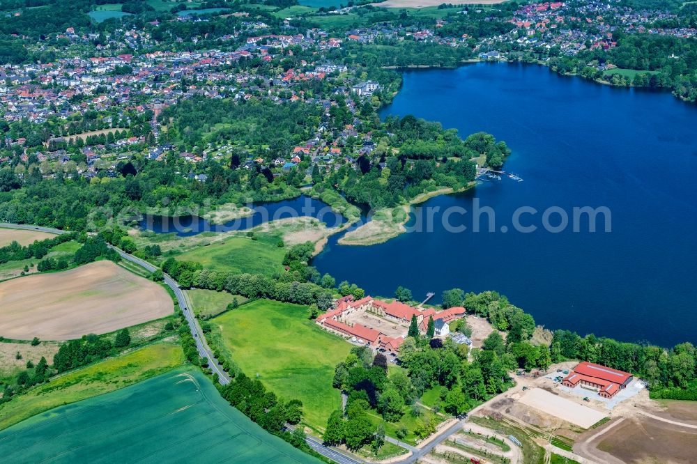 Malente from the bird's eye view: Part of town bath Malente-Gremsmuehlen in Malente in the federal state Schleswig-Holstein