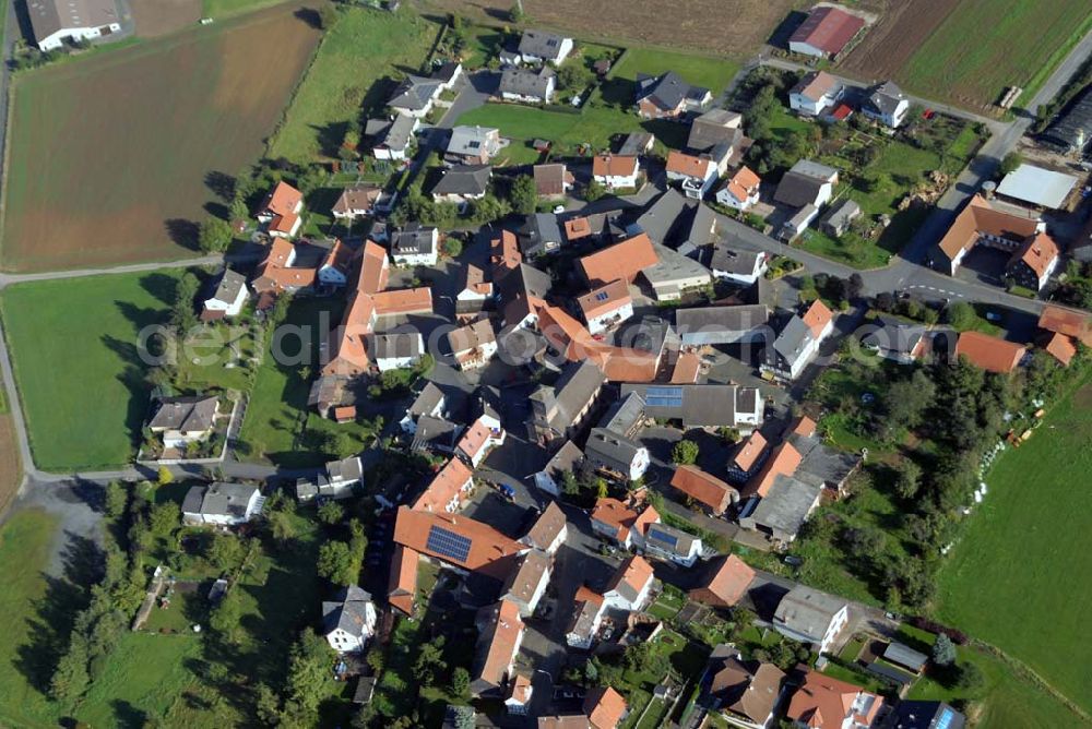 Erfurtshausen from the bird's eye view: Blick auf Erfurtshausen, einem Stadtteil von Amöneburg. Amöneburg ist eine Stadt im Landkreis Marburg-Biedenkopf in Hessen (Deutschland). Sie liegt auf einem Berg rings um die gleichnamige Burg Amöneburg. Die Stadt hat ursprünglich Ihren Namen von dem in der Nähe vorbeifliessenden Fluss Ohm und von der auf der Kuppe des ehemaligen Vulkans liegenden Burg.