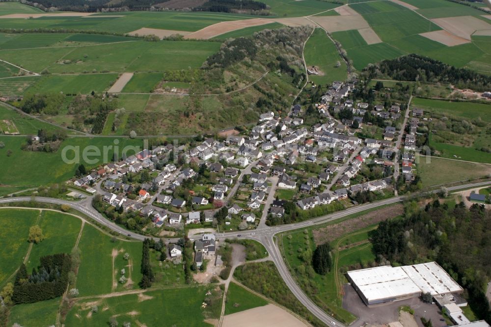 Aerial image Trier Filsch - View of the residential area with family houses of Filsch. Filsch is the smallest district of Trier and is located on the outskirts. The district is surrounded by meadows, forests and hills. At the village lies along the road 144 L144. The district is located in Trier in Rhineland-Palatinate