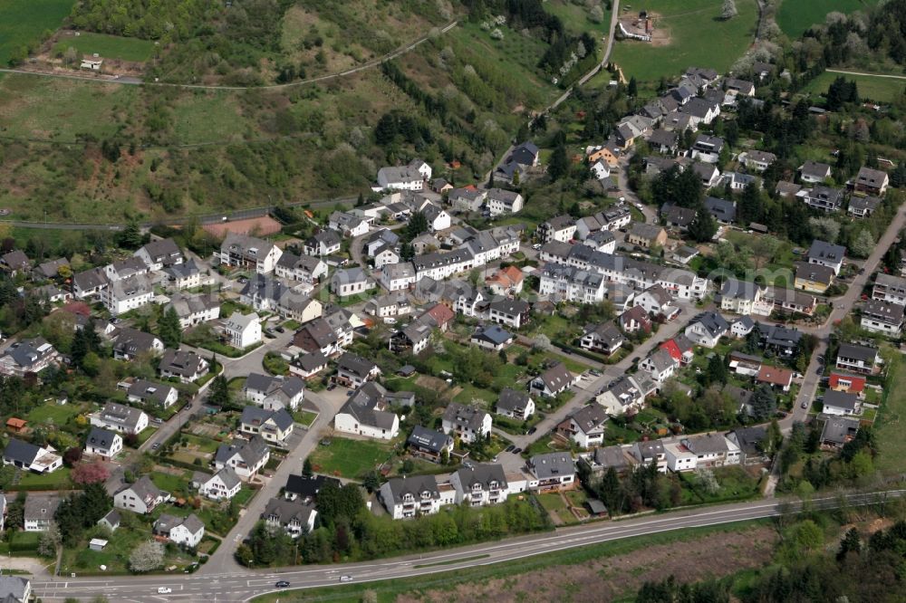 Trier Filsch from above - View of the residential area with family houses of Filsch. Filsch is the smallest district of Trier and is located on the outskirts. The district is surrounded by meadows, forests and hills. At the village lies along the road 144 L144. The district is located in Trier in Rhineland-Palatinate