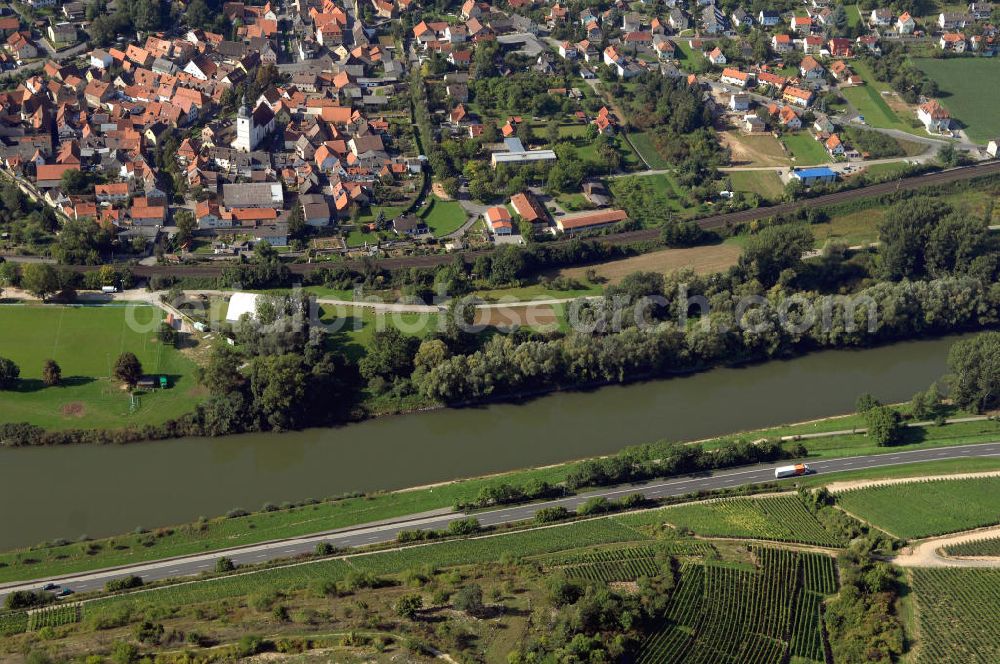 OCHSENFURT from the bird's eye view: Blick auf den Stadtteil Goßmannsdorf von Ochsenfurt am Main. Ochsenfurt ist eine Stadt im unterfränkischen Landkreis Würzburg und liegt im südlichen Maindreieck. Kontakt: Stadt Ochsenfurt, Hauptstrasse 42, 97199 Ochsenfurt, Tel. +49 (0)9331 97 0, Fax 09331 97 52, e-mail: info@ochsenfurt.com