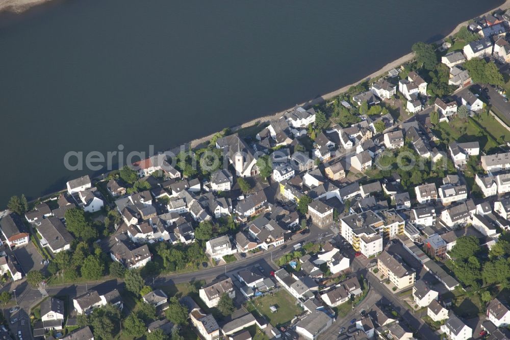 Aerial photograph Koblenz - District Kesselheim in the city in Koblenz in the state Rhineland-Palatinate, Germany. The district is located directly on the River Rhine. In the center of the picture the parish church of Saint Martin