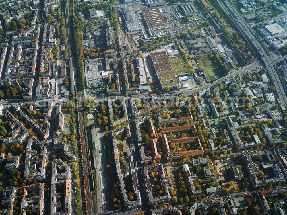 Berlin from the bird's eye view: District Neukoelln and ist rails from the Deutsche Bahn AG and the motorway A 100 in the city in Berlin in Germany