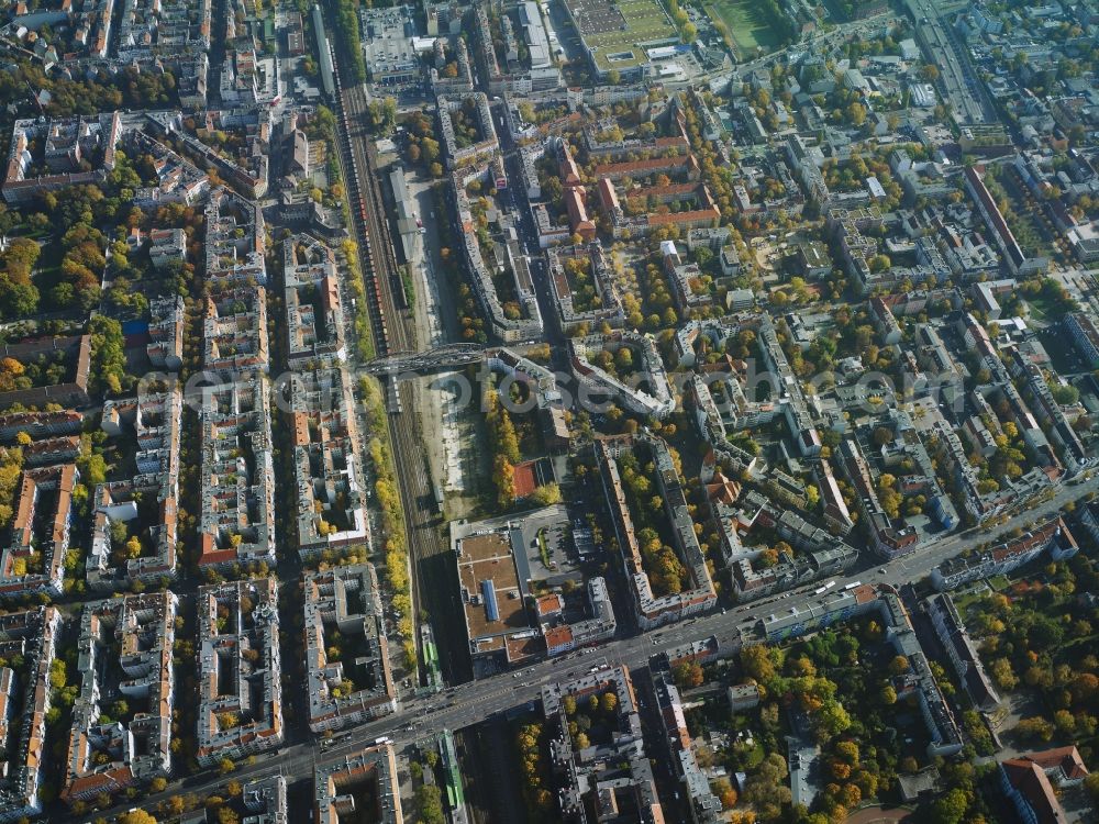 Berlin from above - District Neukoelln with the rails of the Deutsche Bahn AG and the nearby Hermannstrasse in the city in Berlin in Germany