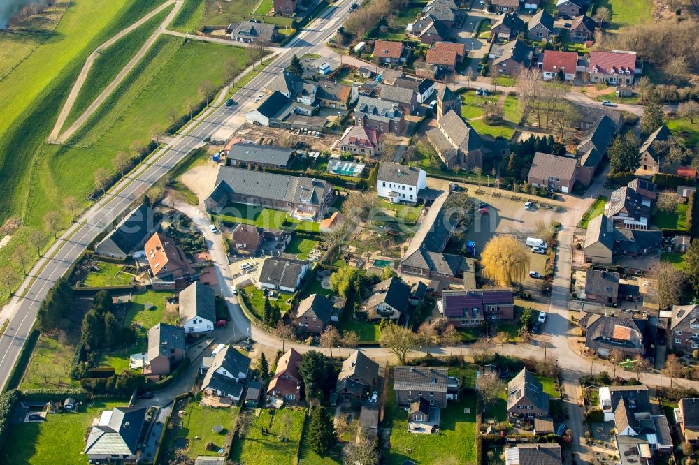 Aerial image Emmerich am Rhein - District Praest with the Catholic Church of St. John in the city area in Emmerich am Rhein in North Rhine-Westphalia