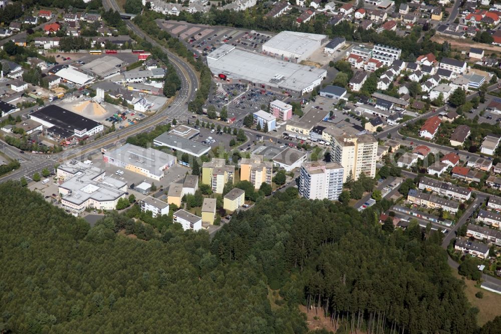 Aerial photograph Taunusstein - District in the urban area in Taunusstein in Hesse with residential buildings, high-rise buildings and industrial area