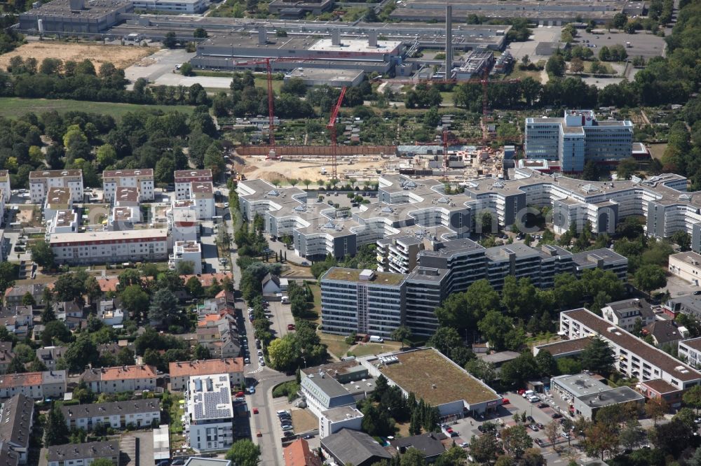 Aerial photograph Mainz - District Weisenau in the city in Mainz in the state Rhineland-Palatinate. At the construction site are creating new homes