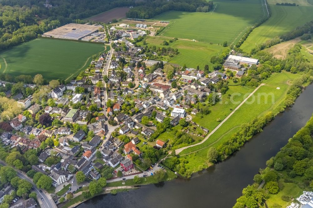 Essen from the bird's eye view: Cityscape of the district along the Landsberger Strasse overlooking to demolition work at the Schule an der Ruhr on Mintarder Weg in the district Kettwig vor der Bruecke in Essen at Ruhrgebiet in the state North Rhine-Westphalia, Germany