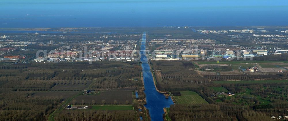 Almere from the bird's eye view: Partial view of the city Almere at the North Sea coast with views of the canal Hoge Vaart in the province of Flevoland in the Netherlands