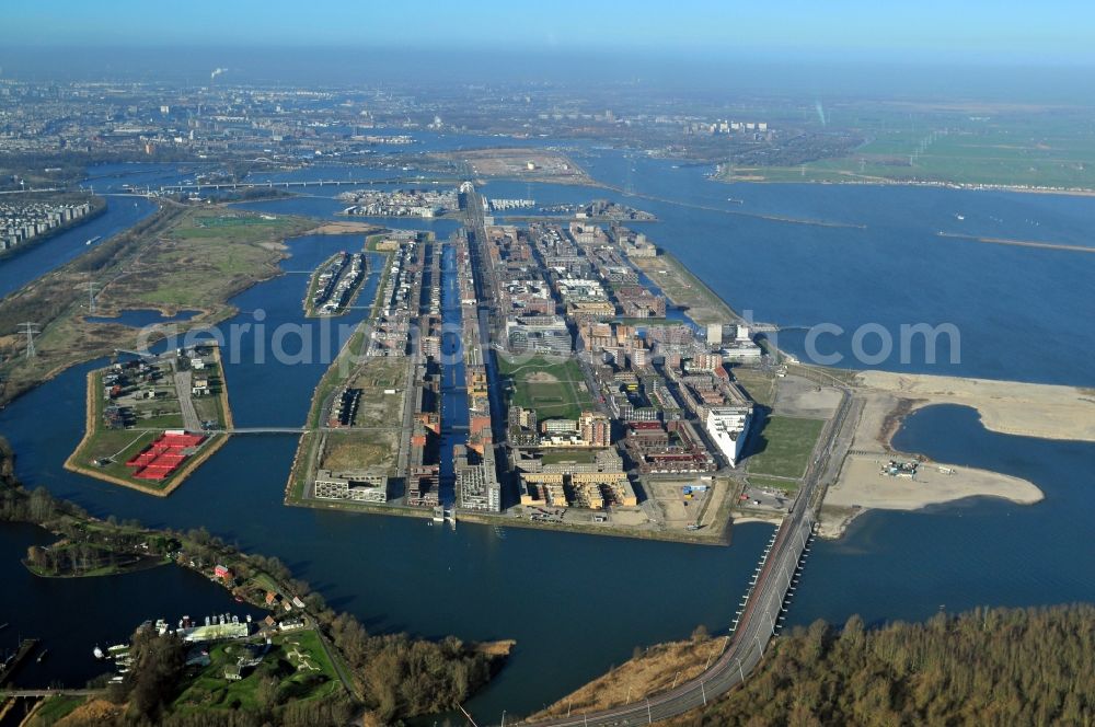 Aerial image Amsterdam - View at the islands IJburg and Steigereiland in the bay IJburgbaai in Amsterdam in the province of North Holland in the Netherlands. Steigereiland and IJburg are two of seven artificial islands of the district IJburg. The artificial islands are released for architectural experiments to country and to water