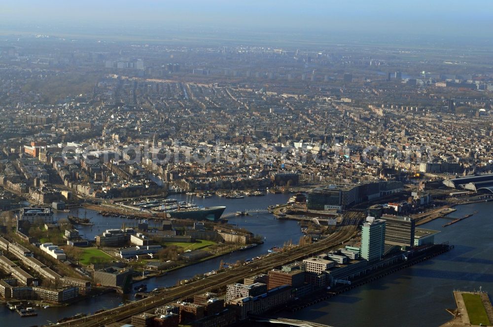 Amsterdam from the bird's eye view: View of the district Nieuwmarkt in which the IJtunnel is located in Amsterdam in the province of North Holland in the Netherlands. The technology museum Nemo was built on the foundation of the IJtunnel. The museum has the shape of a ship and is the entrance to the IJtunnel