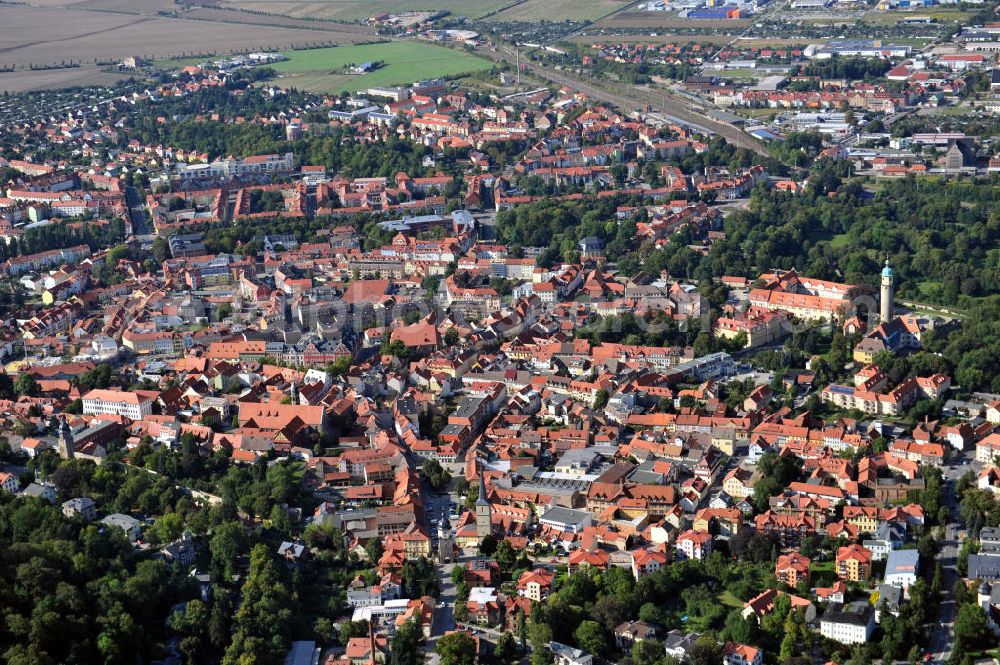 Arnstadt from above - Blick über Arnstadt in Thüringen. Arnstadt war die erste Wirkungsstätte von Johann Sebastian Bach und gilt als Heimat der Thüringer Bratwurst. Durch die Lage am Nordrand des Thüringer Waldes wird Arnstadt auch als Tor zum Thüringer Wald bezeichnet. View over Arnstadt in south of Erfurt in Thuringia. Arnstadt was first place of activity of Baroque period composer and musician Johann Sebastian Bach and is regarded as home of Thuringian bratwurst. Because of its location on the northern edge of Thuringian Forest, Arnstadt is also called Gate to Thuringian Forest.